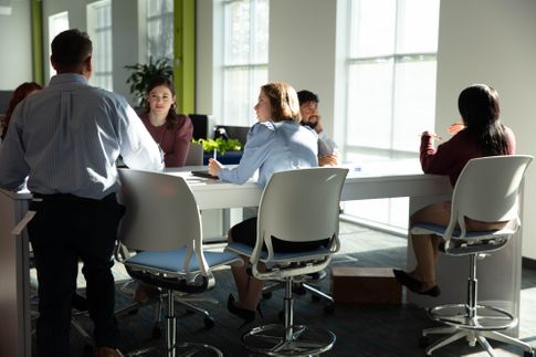 Woman accessing ServiceLink Title on her laptop in her own home